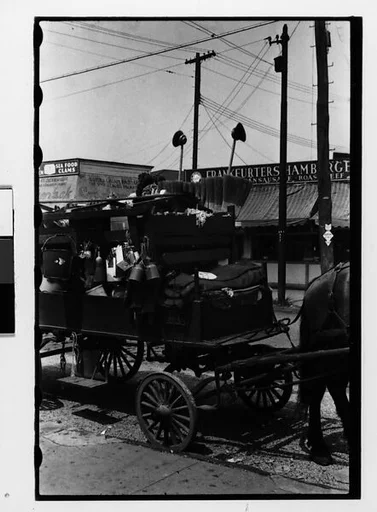 [Two 35mm Film Frames: Horse-Drawn Houseware Vendor's Cart, New York City]