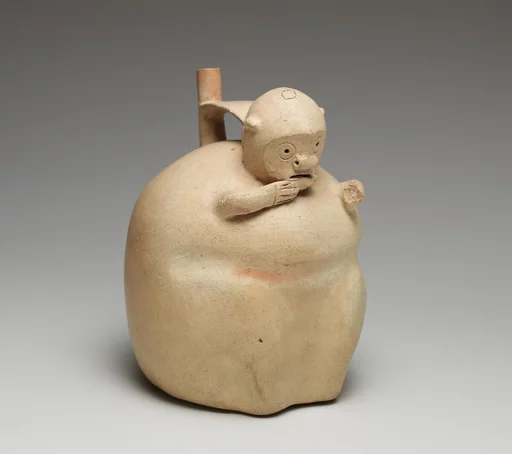Monkey-shaped spout-and-bridge bottle