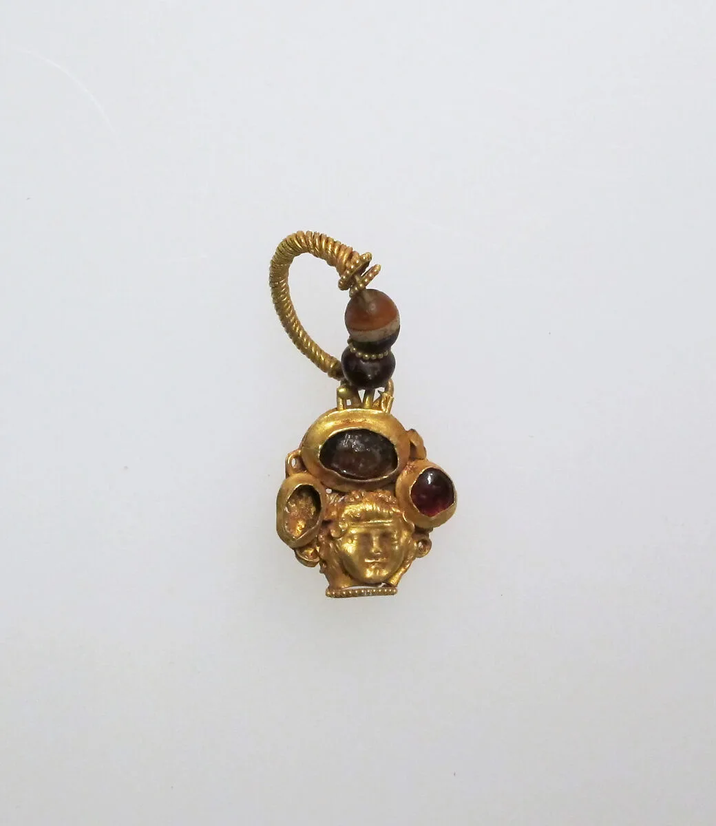 Earring with human face — Unknown