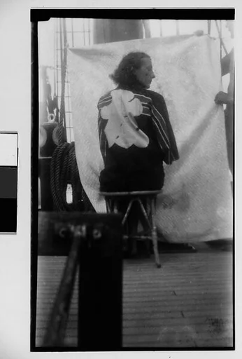 [South Seas: Woman in Kimono Seated on the Deck of the Cressida, From Behind]