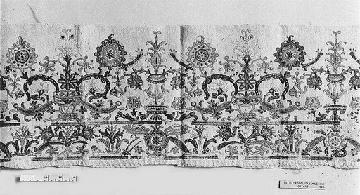 Portion of a dress border