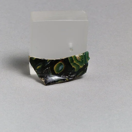 Glass mosaic carinated bowl fragment