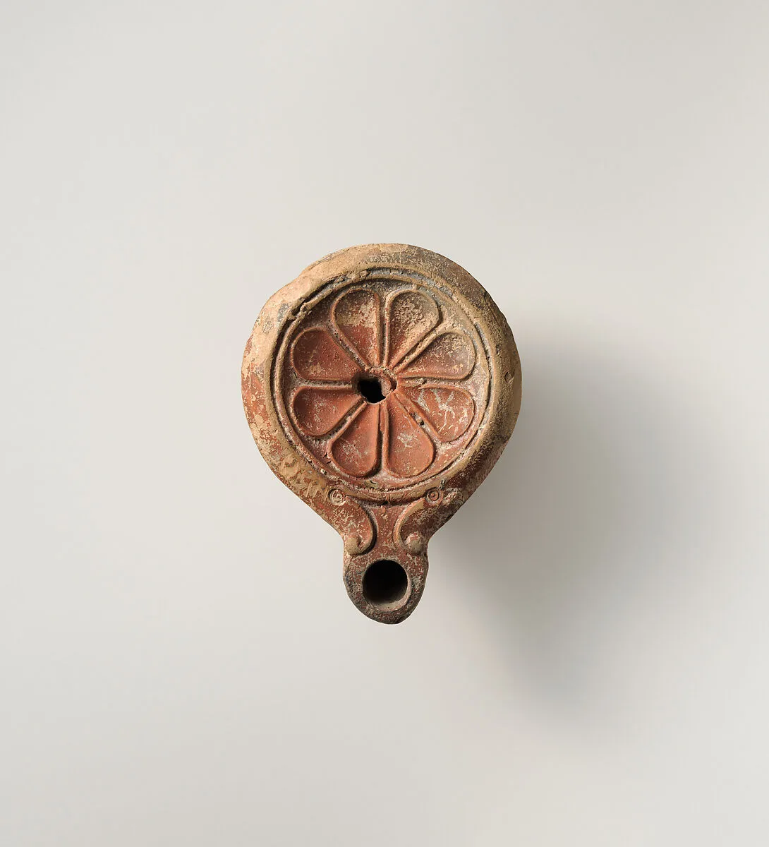 Terracotta oil lamp — Unknown