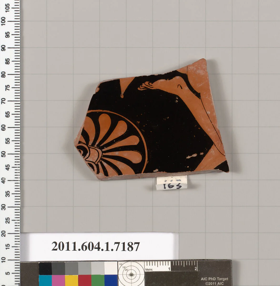 Terracotta fragment of a kylix (drinking cup) — Makron