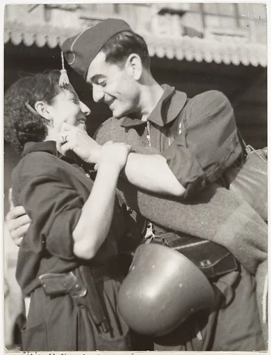[Soldier Embracing Woman, Barcelona, Spain]