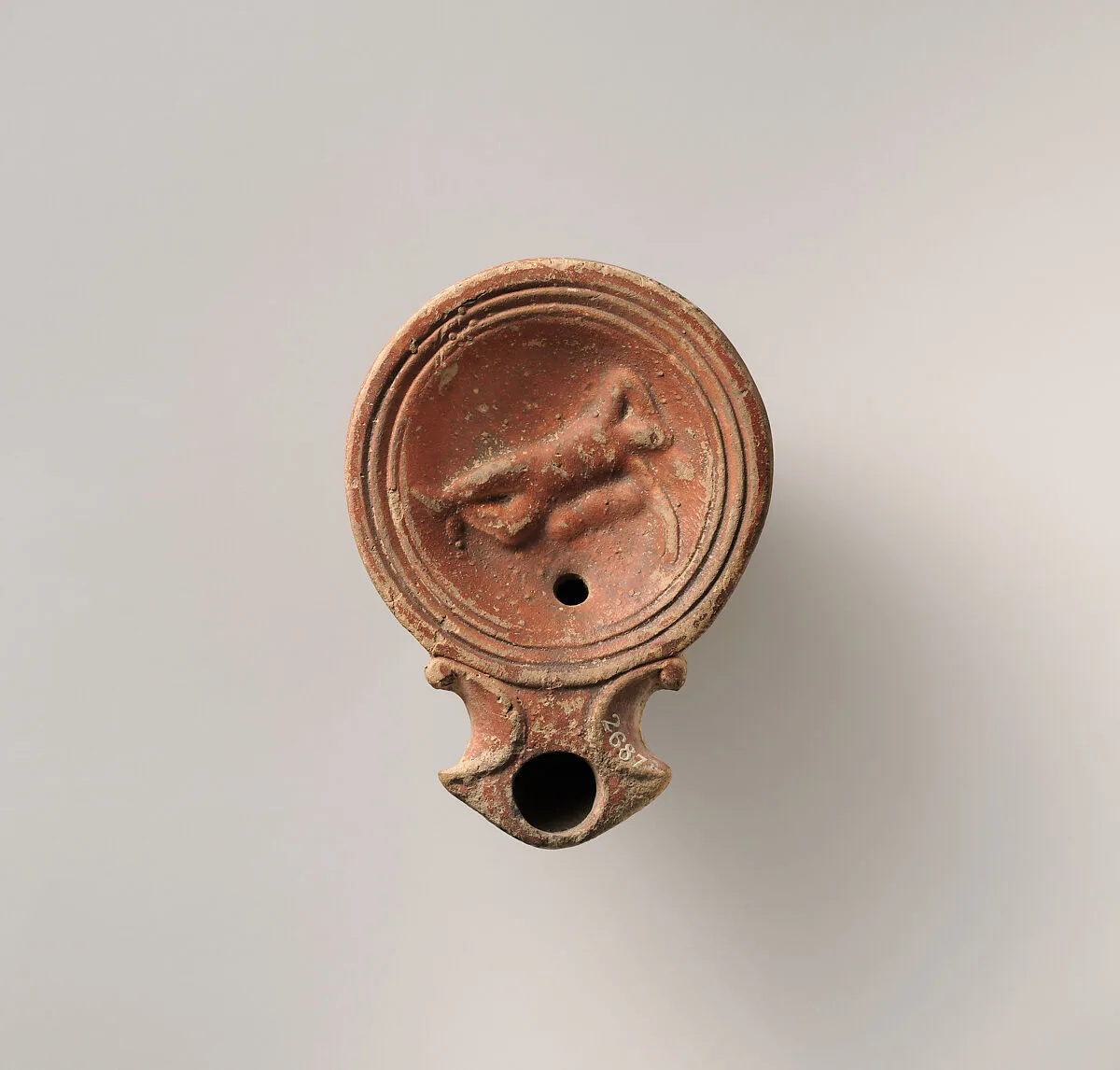 Terracotta oil lamp — Unknown