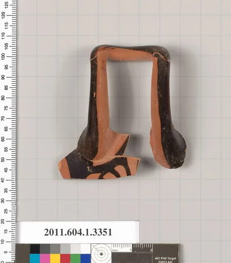 Terracotta fragment of a kylix (drinking cup)