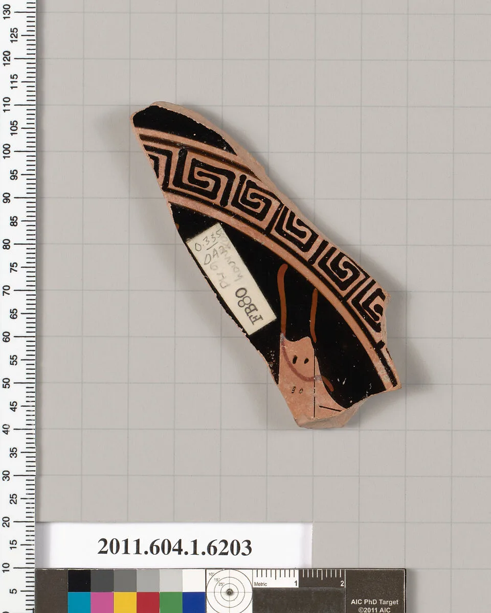 Terracotta fragment of a kylix (drinking cup) — Painter of the Louvre Komoi