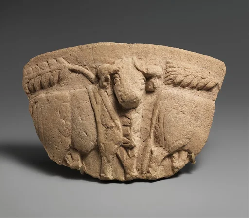 Fragment of a vessel with wheat stalks and a procession of bulls in relief