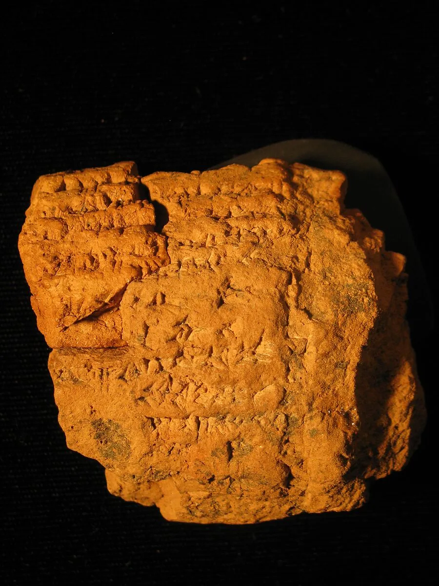 Fragment of a solid clay barrel cylinder inscribed with an unidentified hymn — Unknown