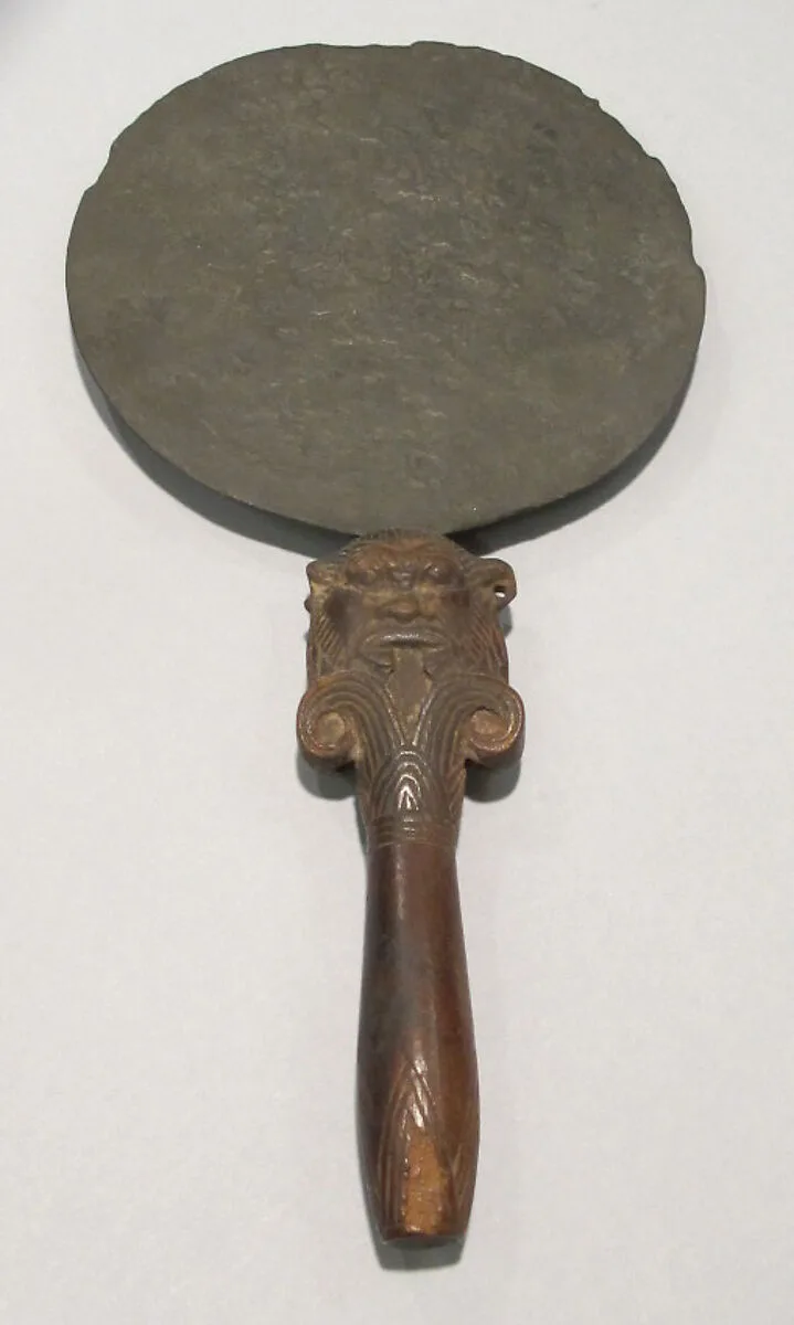 Mirror with a Lotus Handle Decorated with the Head of Bes — Unknown