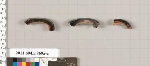 Terracotta fragments of kylikes (drinking cups)