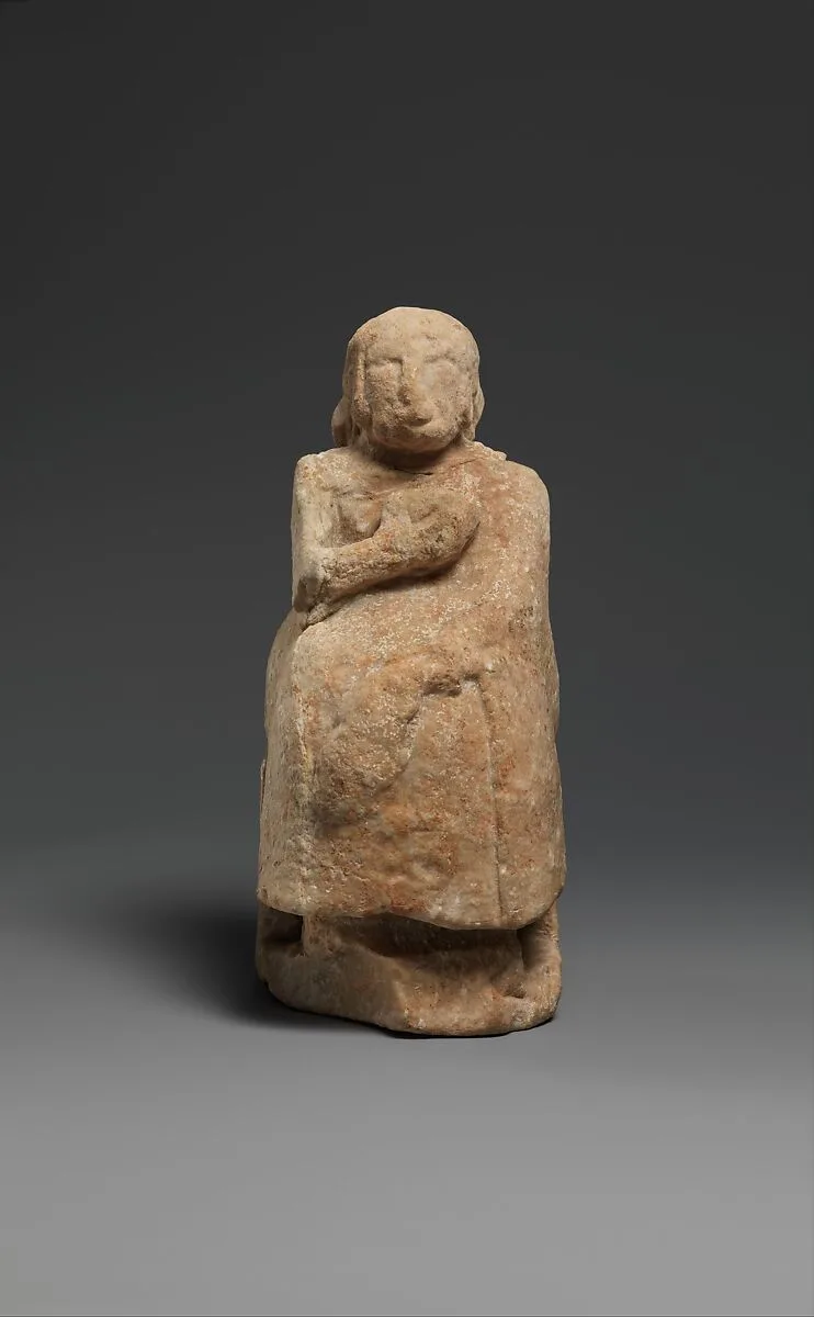 Seated female figure — Unknown