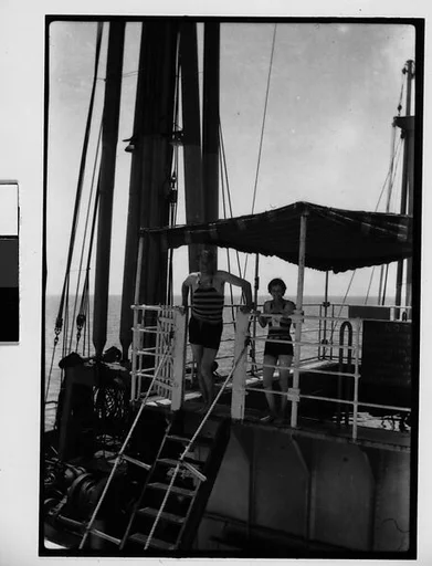 [Couple in Bathing Suits on Deck of Boat]