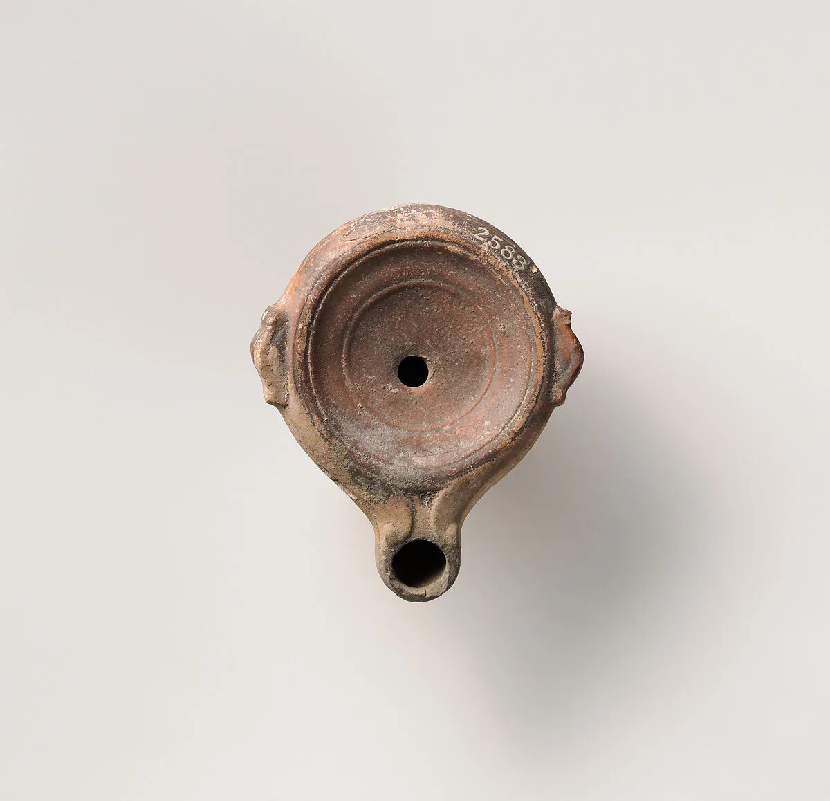 Terracotta oil lamp — Unknown