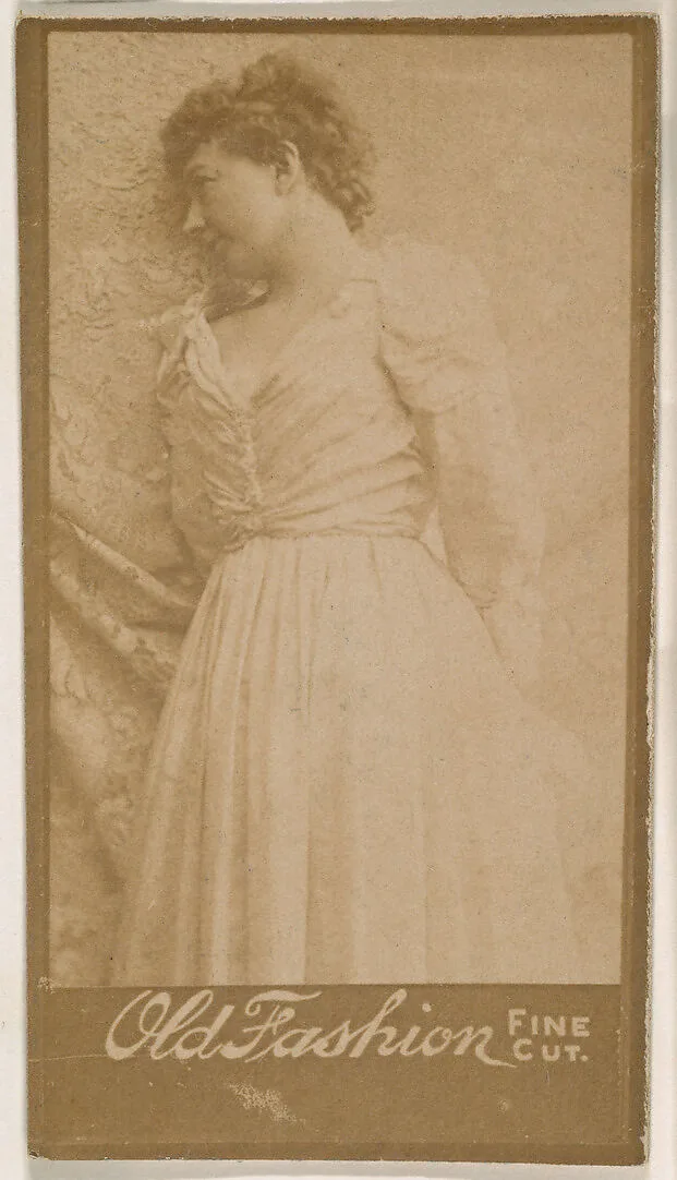 Actress leaning against studio curtain, from the Actresses series (N664) promoting Old Fashion Fine Cut Tobacco — Unknown