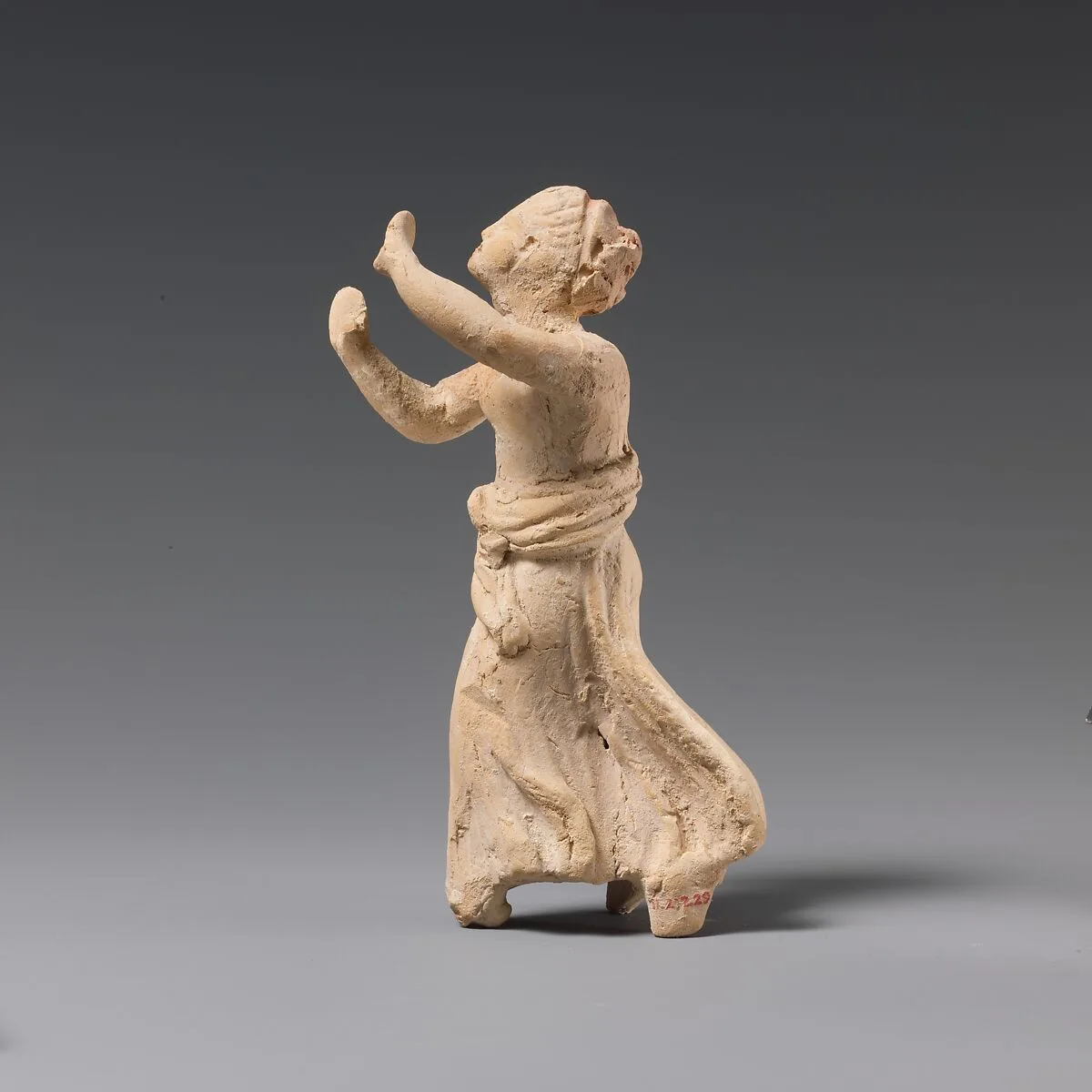 Terracotta statuette of a girl — Unknown