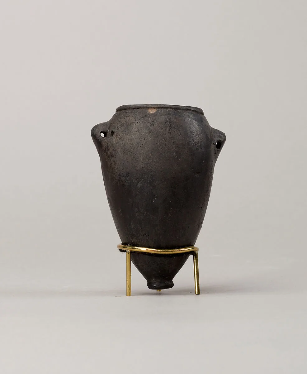 Black polish ware jar with lugs — Unknown