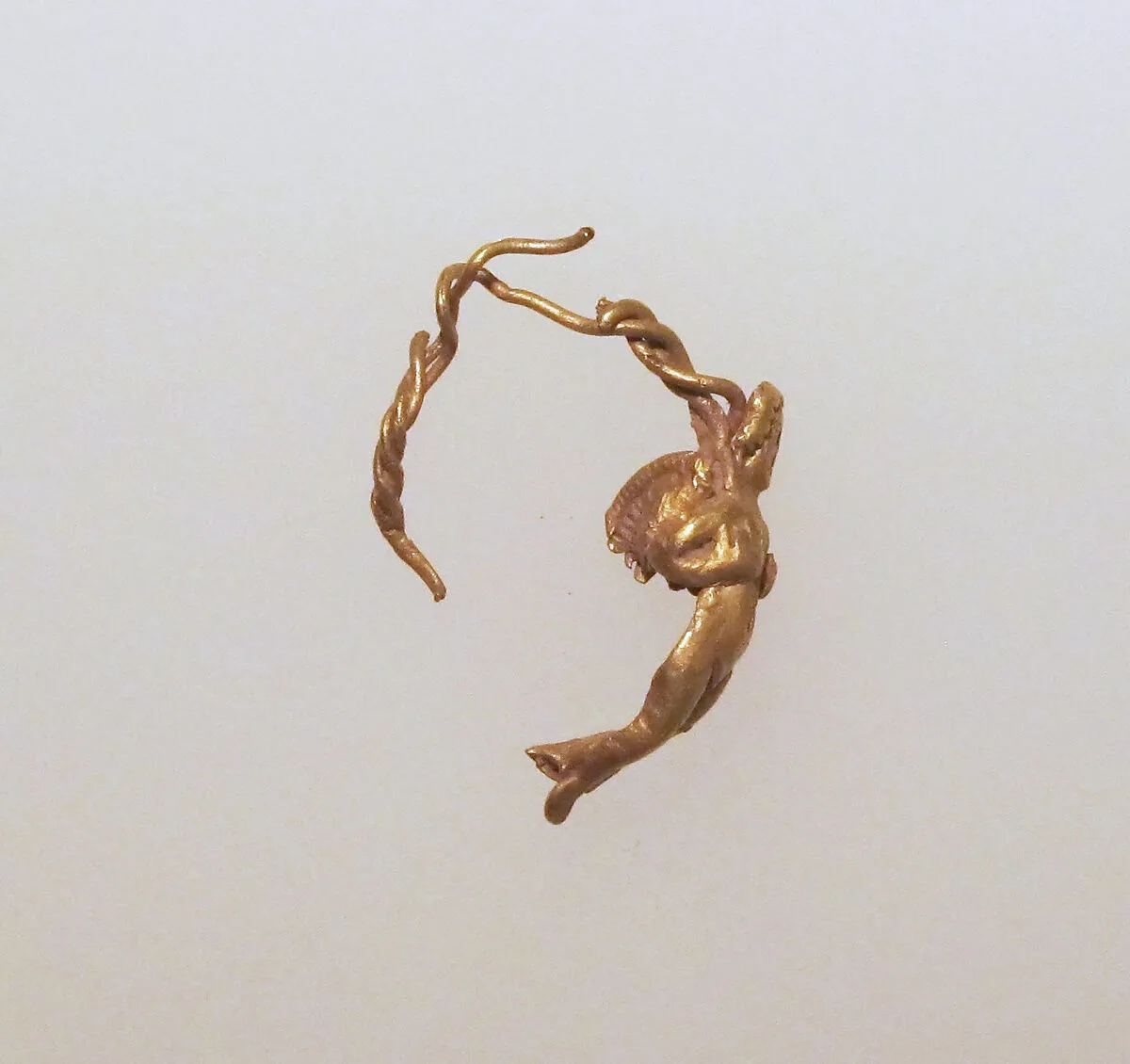 Gold earring with winged Eros — Unknown