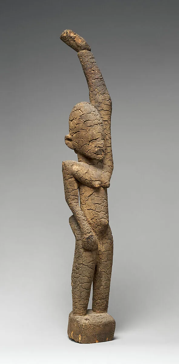Female Figure with Raised Arm — Unknown