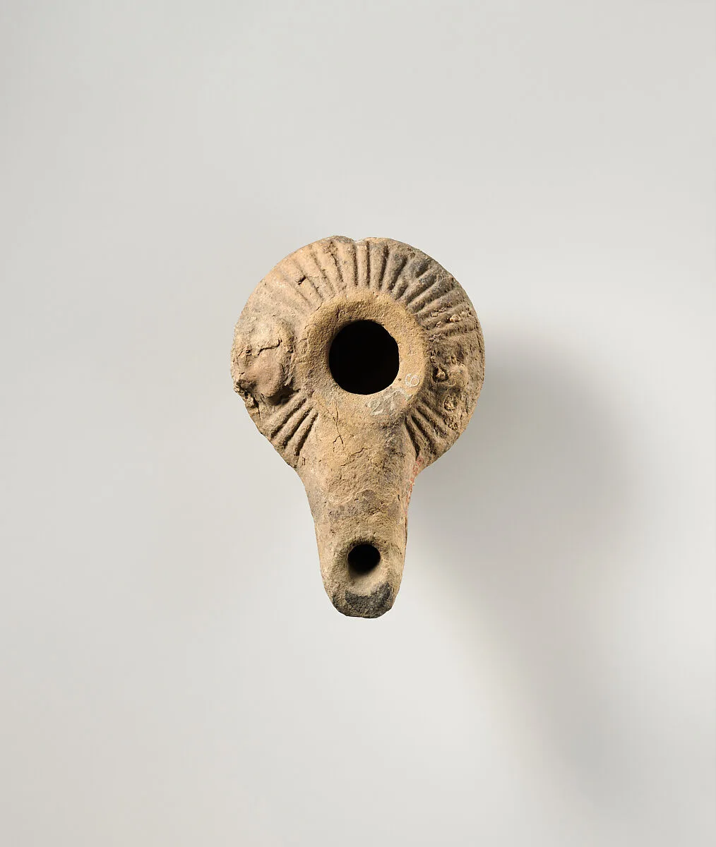 Terracotta oil lamp — Unknown