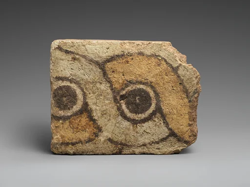 Brick fragment with a guilloche design