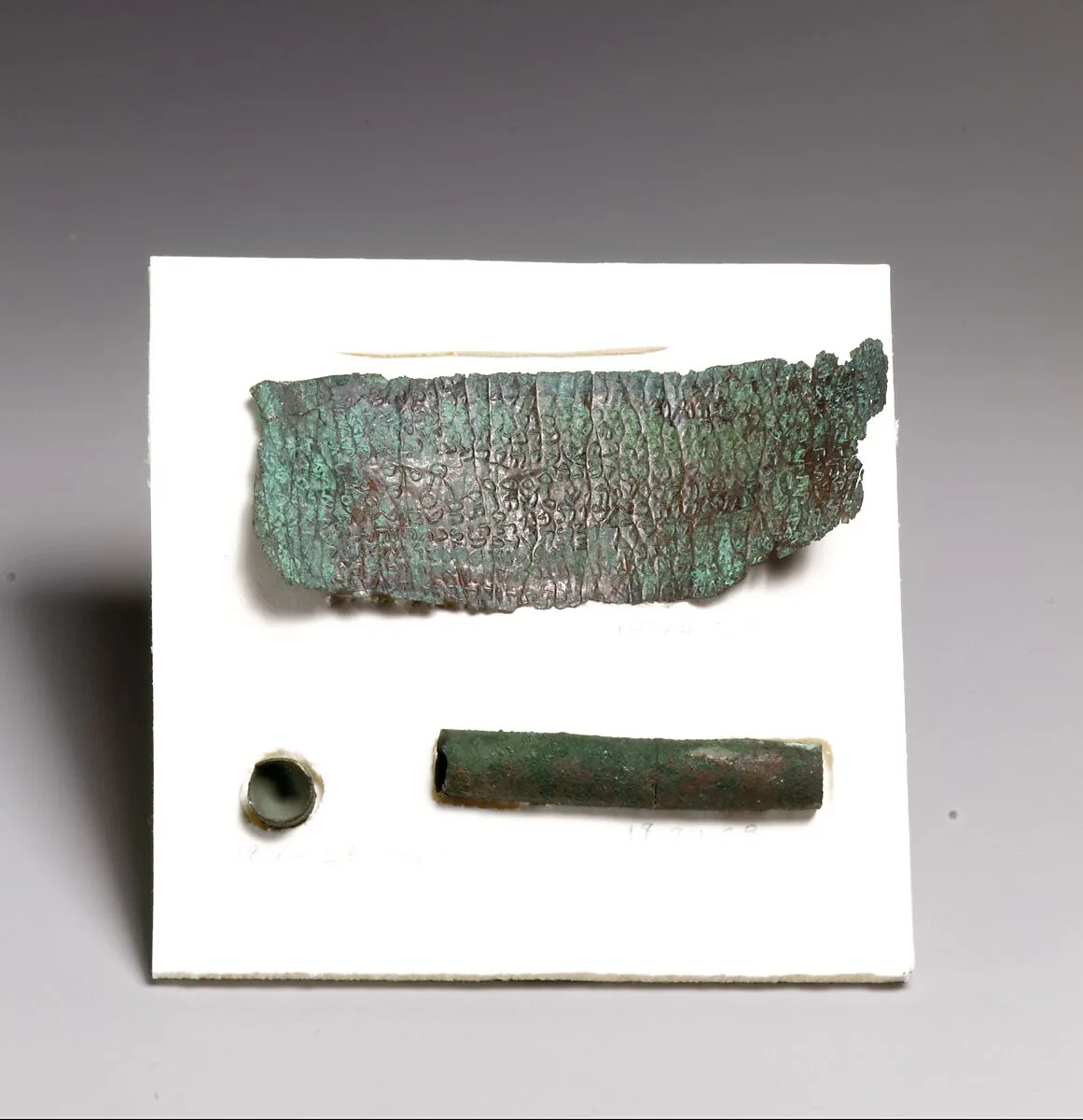 Amulet in the form of an inscribed bronze sheet — Unknown