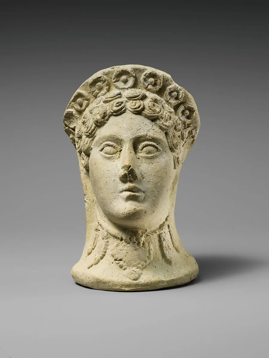 Terracotta head of a woman — Unknown