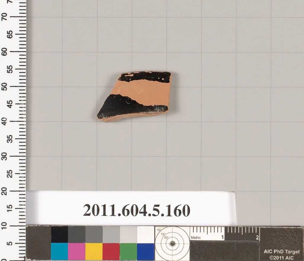 Terracotta rim fragment of a kylix (drinking cup)? — Unknown