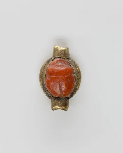 Scarab set in a ring bezel