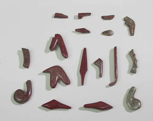 Inlays from shrine: signs and insignias