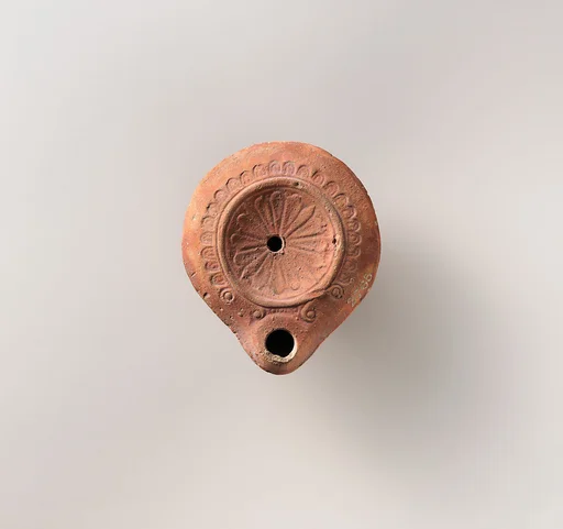 Terracotta oil lamp