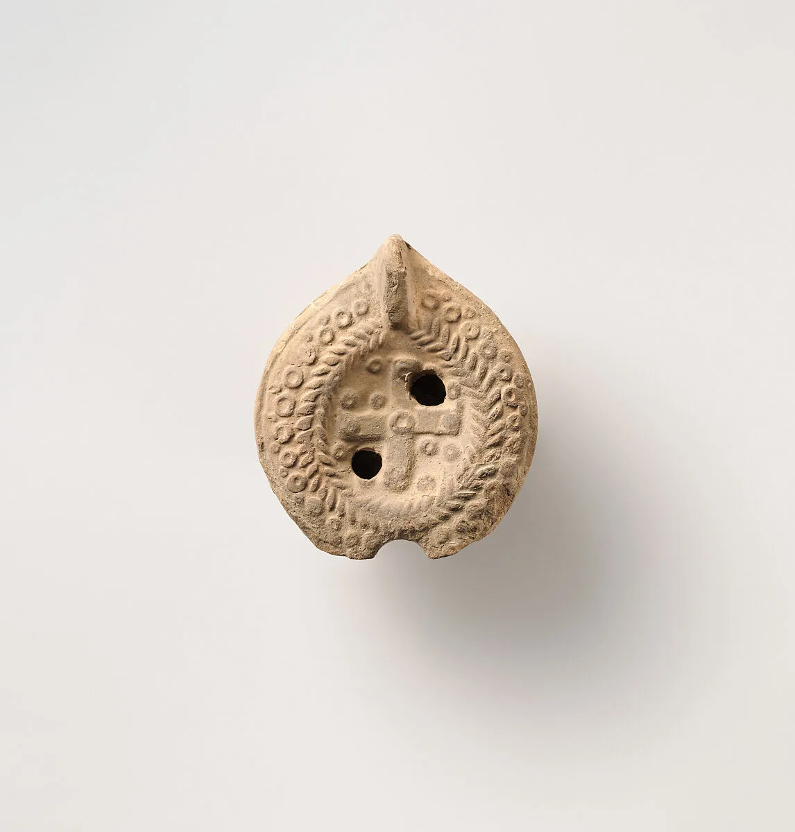 Terracotta oil lamp — Unknown