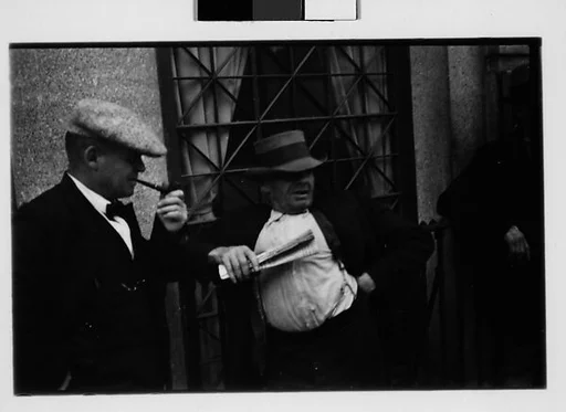 [Two 35mm Film Frames: Men on Street, Ossining, New York]