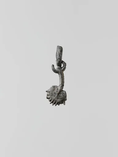 Lead ornament, perhaps vegetal