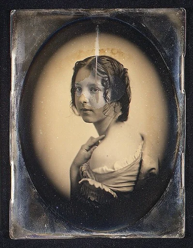 [Young Girl with Hand Raised to Shoulder]