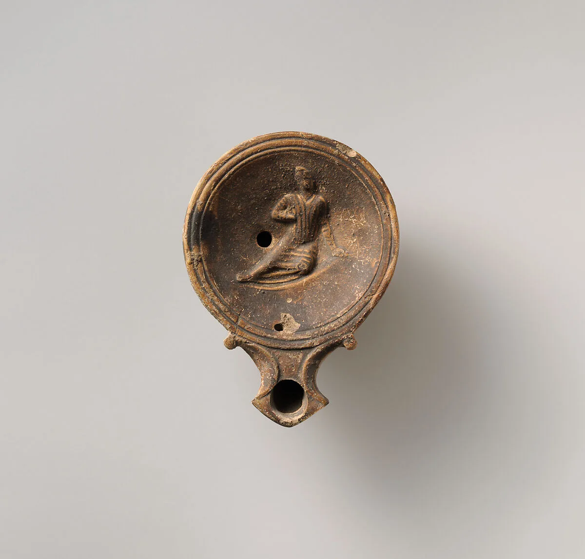 Terracotta oil lamp — Unknown