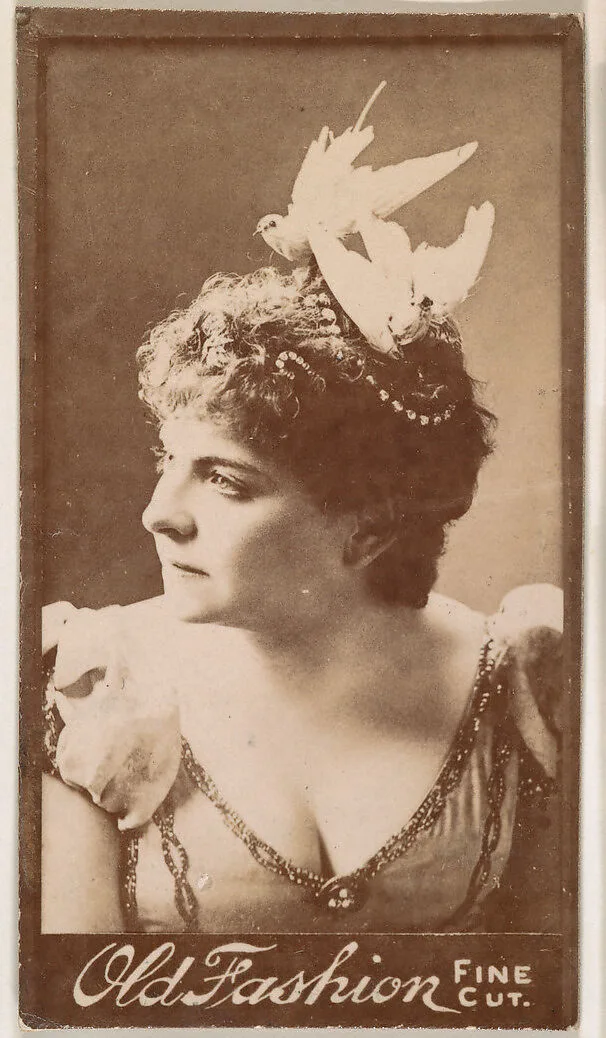 Actress wearing feathered headpiece, from the Actresses series (N664) promoting Old Fashion Fine Cut Tobacco — Unknown