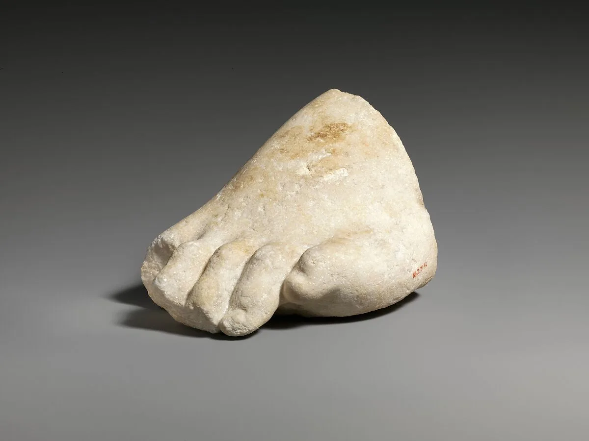 Part of the left foot of a colossal marble statue — Unknown