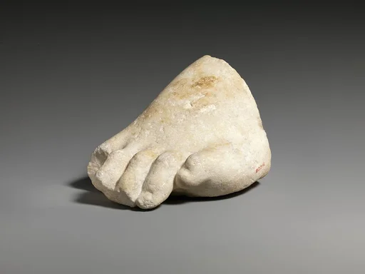 Part of the left foot of a colossal marble statue