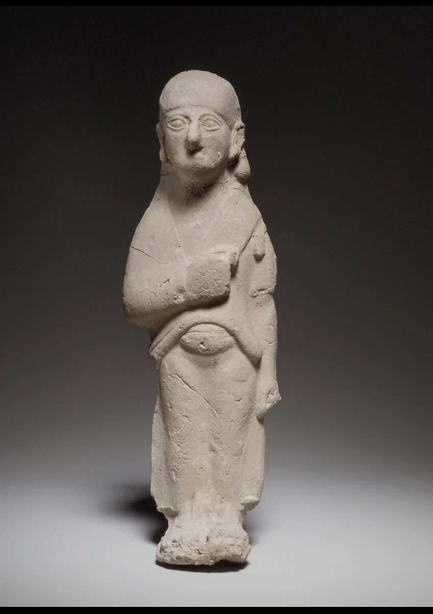 Standing female figurine — Unknown