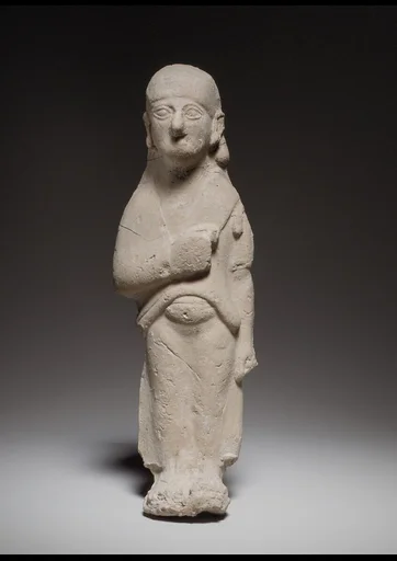 Standing female figurine