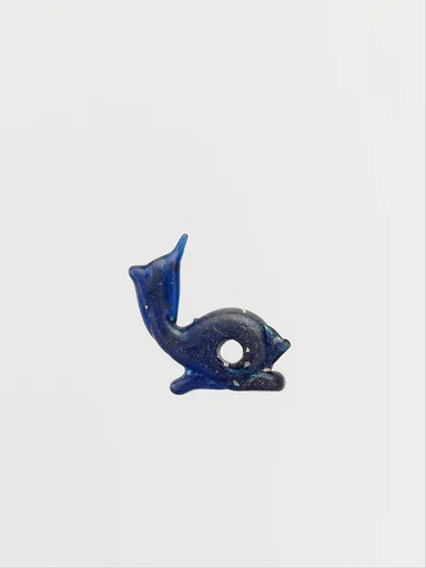 Glass pendant in the form of a dolphin