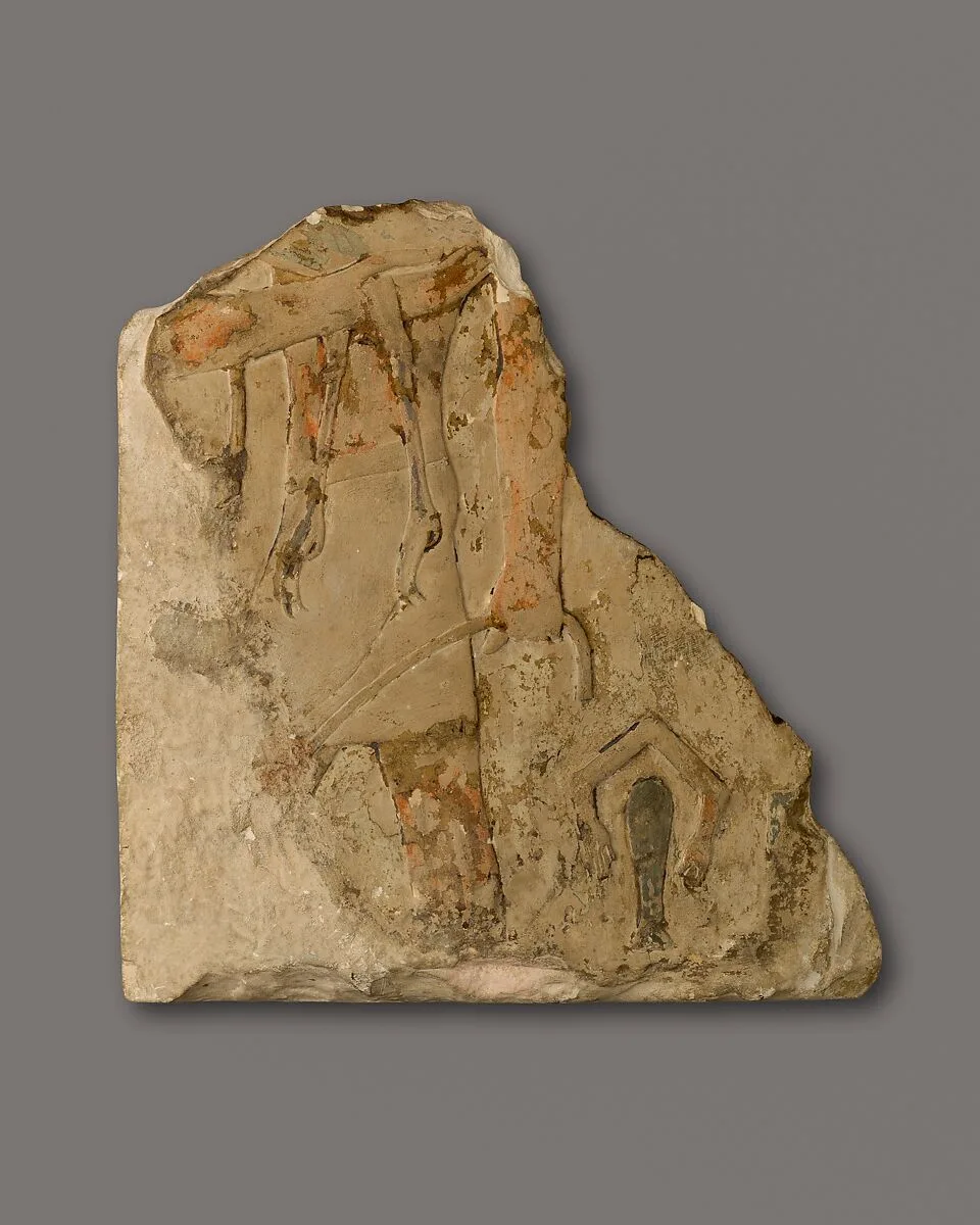 Relief fragment of a man carrying an ostrich — Unknown