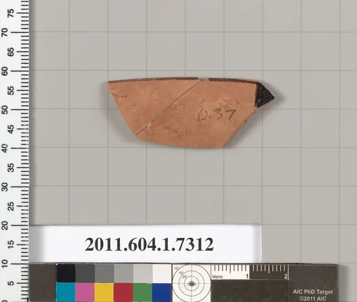 Terracotta rim fragment of a kylix (drinking cup)