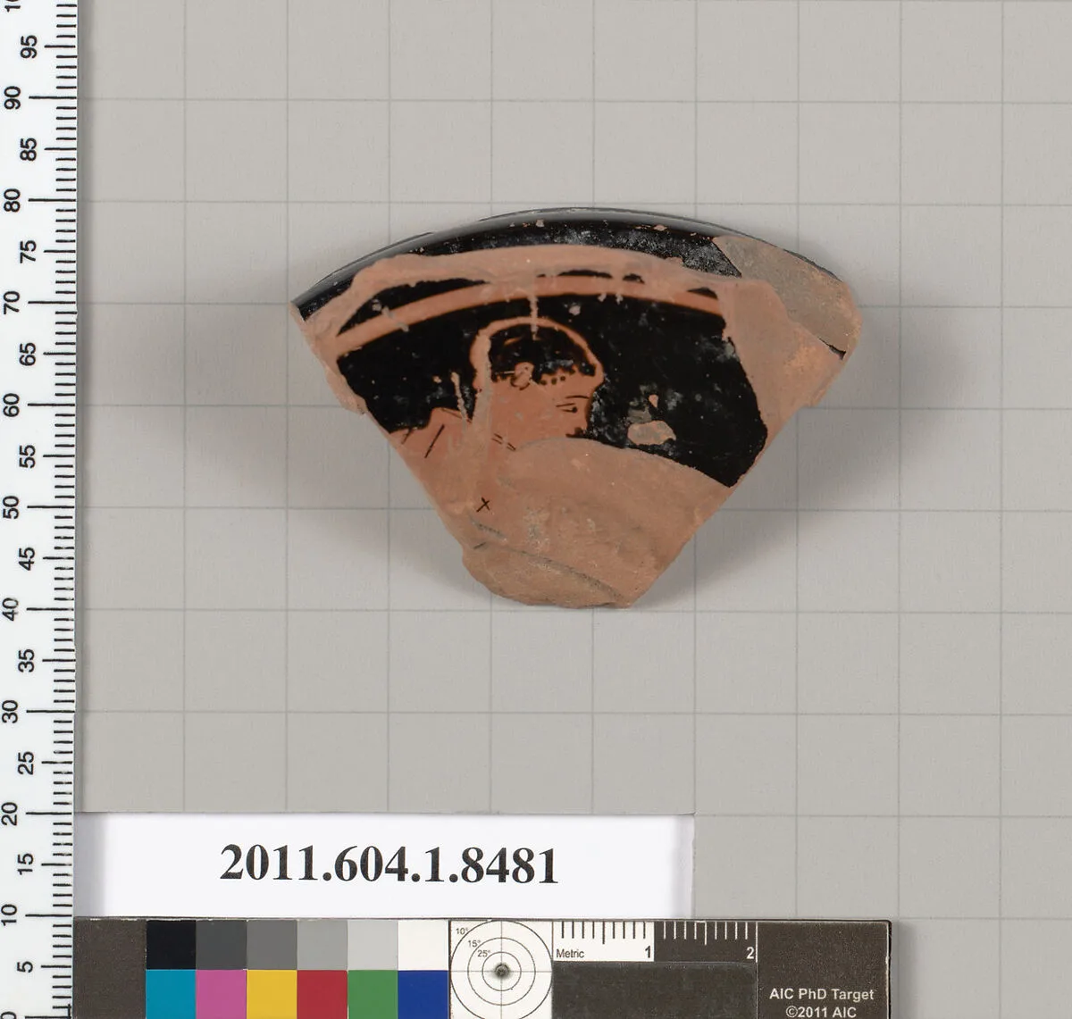 Terracotta fragment of a stemless kylix (drinking cup) — Unknown