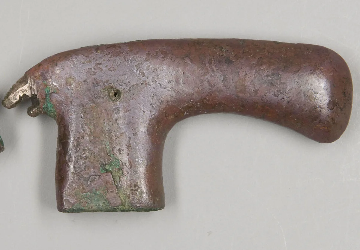 Fragmentary axe head (?) — Unknown