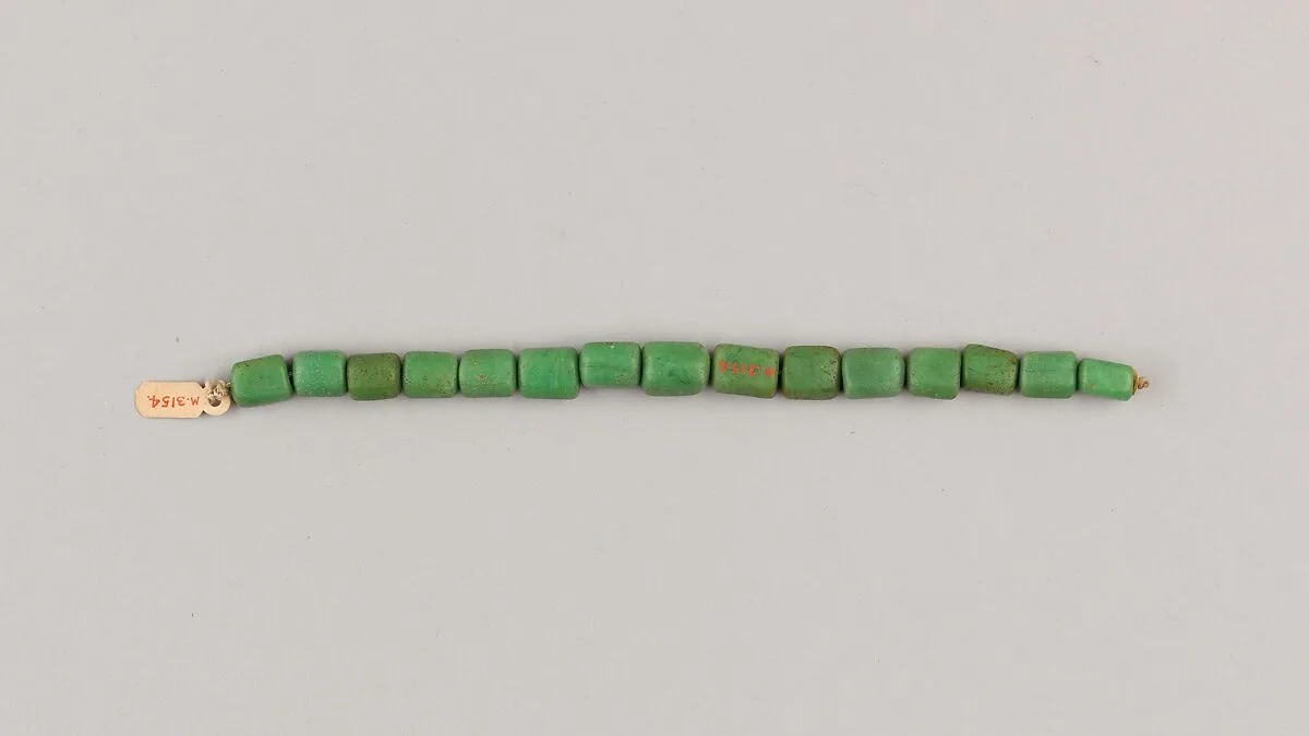 String of 15 hexagonal beads — Unknown