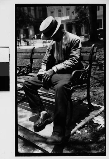 [Man Wearing Boater Asleep on Bench in Park, Havana]