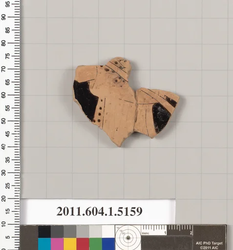Terracotta fragment of a kylix (drinking cup)